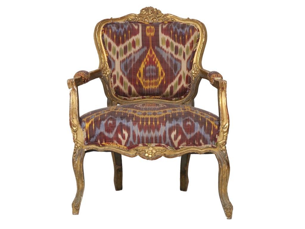 Gilt chair reupholstered in vintage ikat and burlap.
