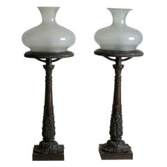 Pair of bronze oil lamps