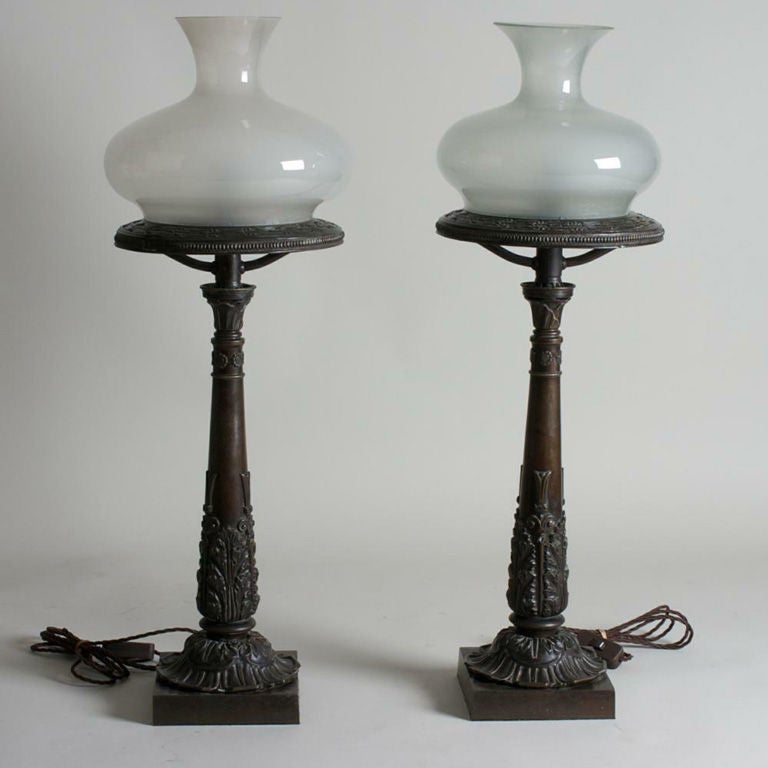 Pair of bronze oil lamps