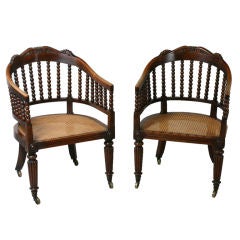 Pair of caned bergeres