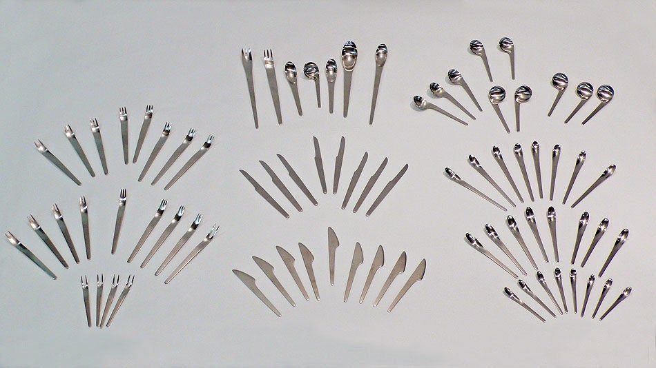 Absolutely Incredible set of Stainless Flatware complete service for eight plus two left handed spoons, two serving forks, ladle, four olive forks and four serving spoons total of 78 pieces.  This set is early and was only used twice a year for the