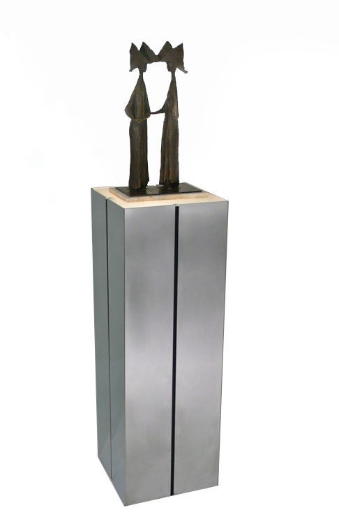 A remarkable bronze sculpture by listed Venezuelan artist Hugo Daini titled "Nuns". Purchased in the early 1970s from a gallery in Quebec.

Including the base, it is 19 1/2" high. The dimensions of the base are 11 3/8" wide x 7