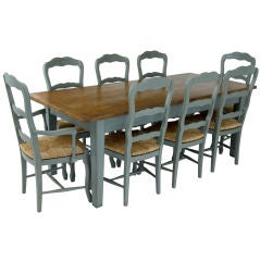 A Fine solid oak refectory table with a set of eight  chairs.