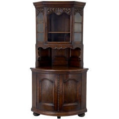 Oak bow front corner cabinet circa 1920