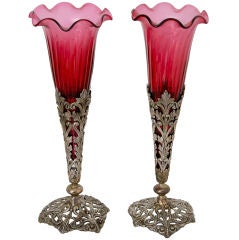 A pair of Cranberry Glass fluted vases