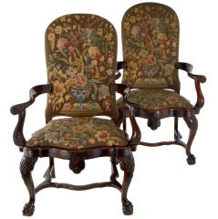 A fine pair of george II style mahogany tapestry arm chairs