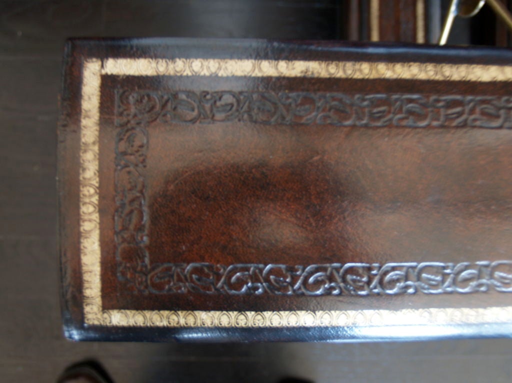 American brass and leather fireplace fender