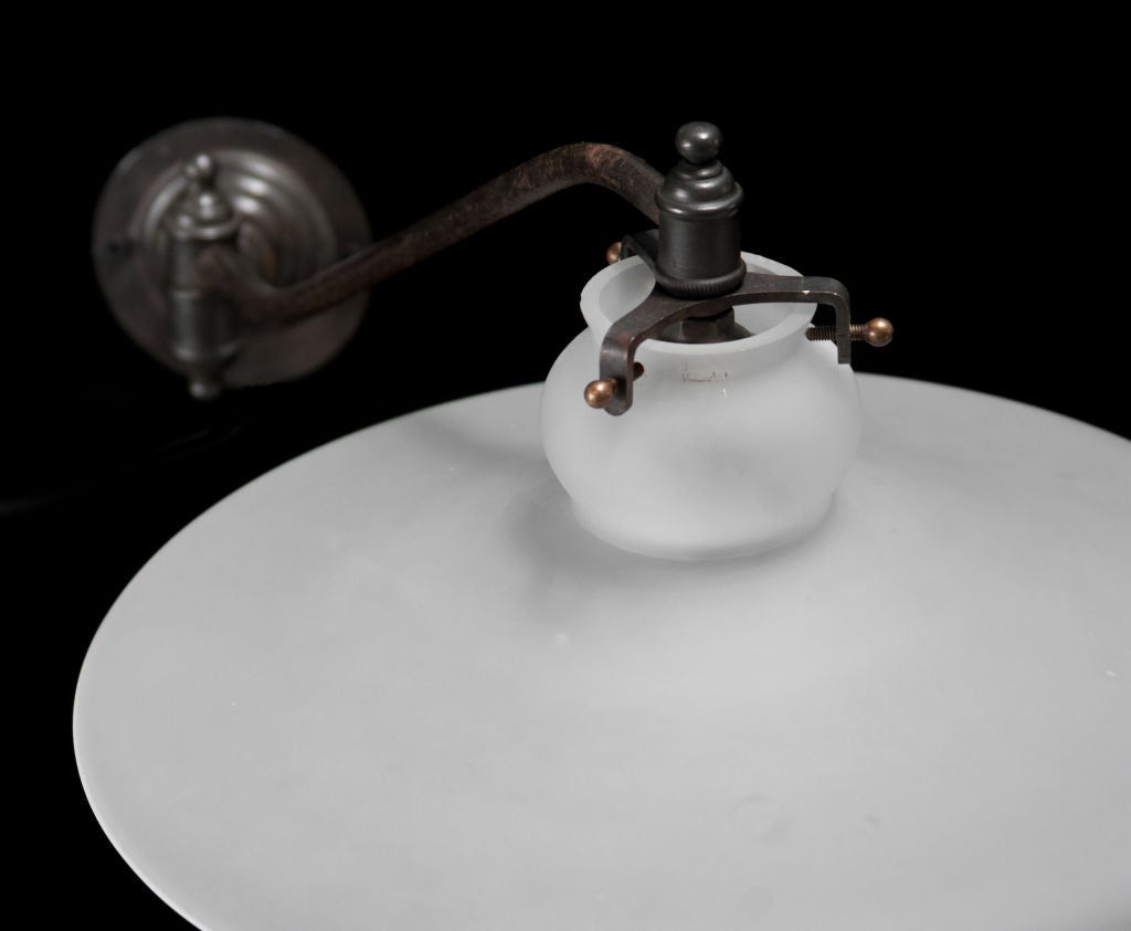 Iron Wall Sconce with Pivoting Arm and Frosted Glass Shade