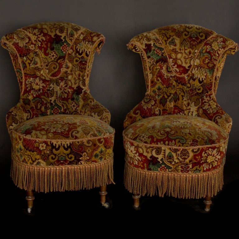 Pair of decorative slipper chairs with original tapestry like velvet fabric, fringe, delightful details.