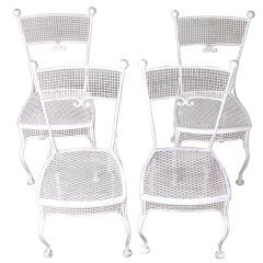 Charming set of four Iron Garden Chairs by Woodard