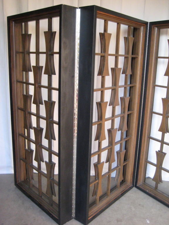 Large double sided three piece screen of Architectural panels. These panels were salvaged from a bank in Oklahoma City and made into this screen.  The measurements are of the screen flattened out.  If you have any questions about this item or about