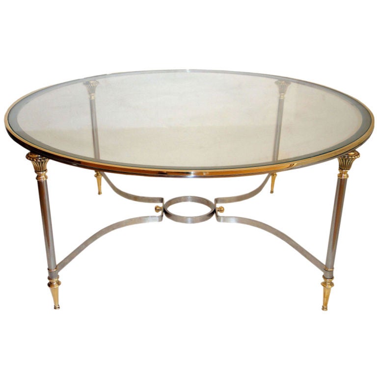 Mesa de centro redonda de acero pulido y cristal de latón Maison Jansen