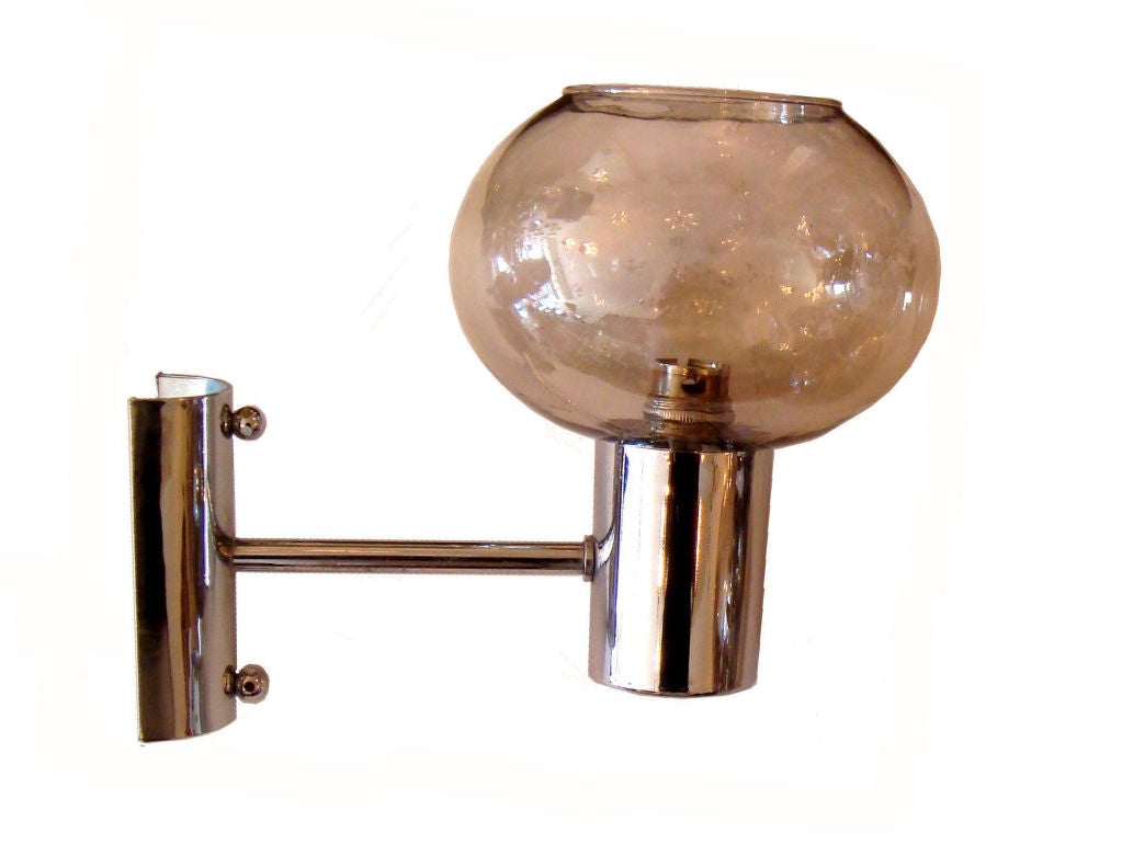Signed DD (Denis Diderot) Pair of sconces, wall lights in Chrome with smoked blown Glass Shades.
Matching chandelier available.
Maximum wattage: 75 Watts.
Available also with 2 arms
Wired for US and in working condition
Have a look on our