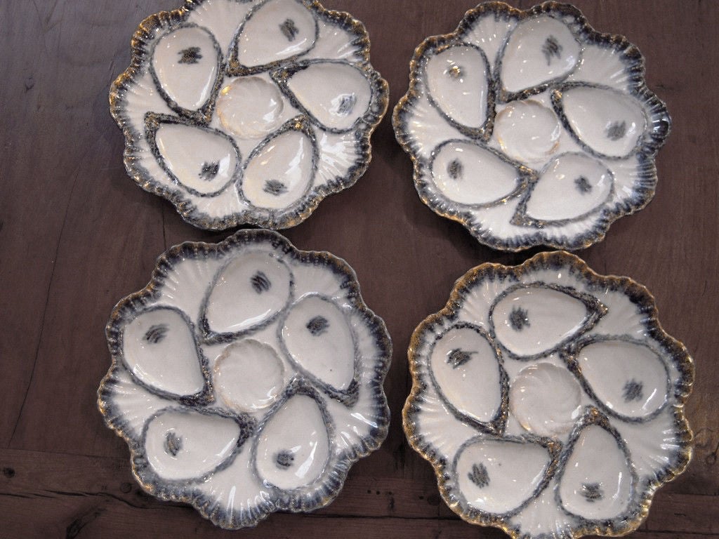 Four Weimar Porcelain Cobalt and Gilt-Decorated Oyster Plates