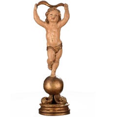 Italian Carved and Polychromed Giltwood Figure of Eros