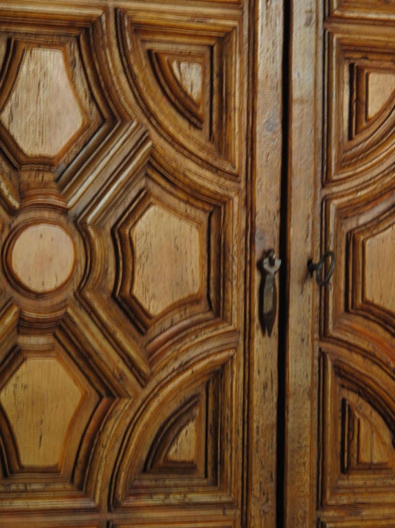 Reconstruction from antique wood in the Spanish Colonial style. Entablature was a Spanish technique of assembling small panels of wood and moldings together to form one large panel. The technique was brought to the Americas during the
