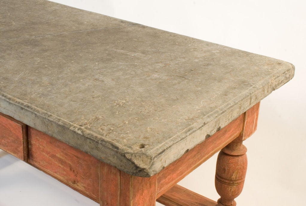 Baroque Stone Top Table with a pink base from the Island of Öland in the Baltic Sea. The 2