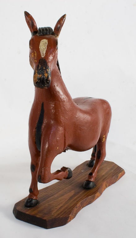 Carved wooden Horse used as a 