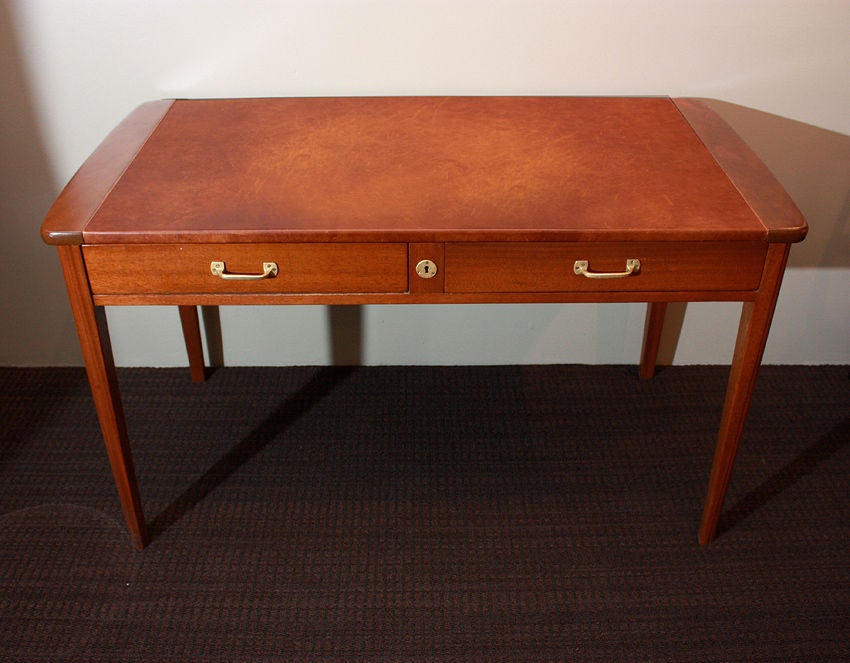 Eugene Printz (1889-1948) 

African mahogany (Provenance Grand Bassam), circa 1932
Two drawers with the original brass handles.
The desk comes with no lock and no key, because all the desks from this University were sold without lock and keys.
The