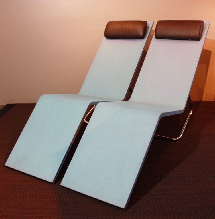 Marteen VAN SEVEREN (1956-2005)<br />
MVS CHAISE (No longer manufactured in BLUE)<br />
VITRA Manufacturer<br />
Provenance: Belgium<br />
Extremely rare pair of chairs, blue structure & brown leather cushion. <br />
Chrome plated base, soft