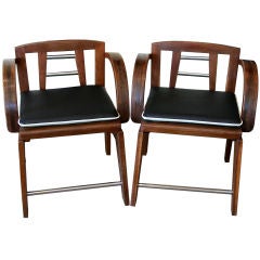 2 pairs of modernist chairs by Andre Sornay