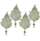 Set of four Venetian glass leaf-motif sconces with gold dust