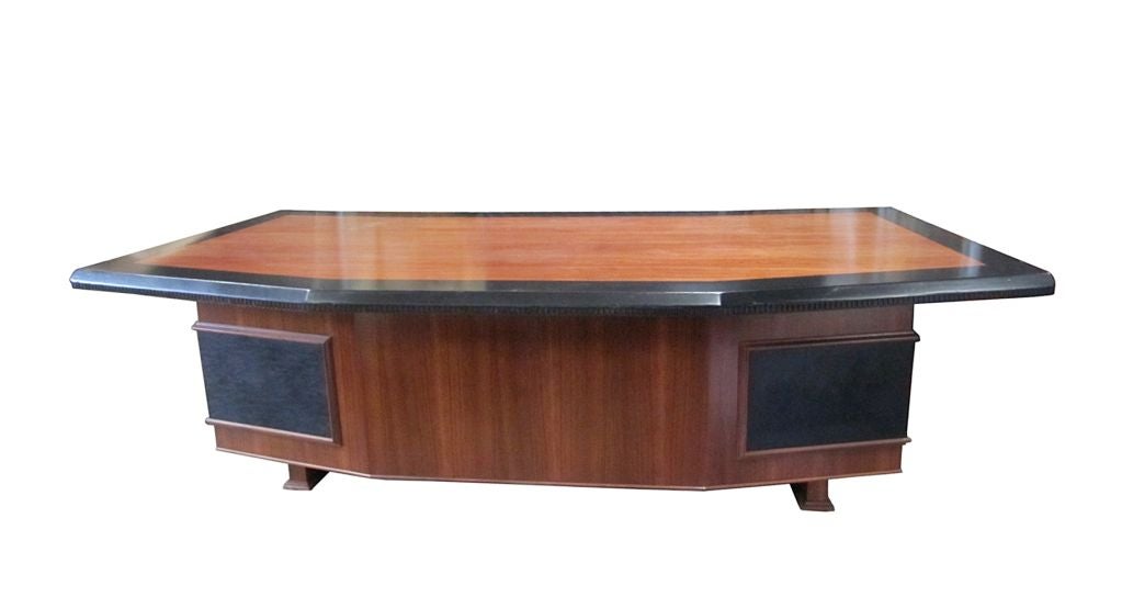 Marvelous executive desk by the well known fine furniture maker Monteverdi & Young of Beverly Hills California.<br />
This impressive desk is a must have for any high power executive.<br />
The desk is very large in size and extremely heavy. It is