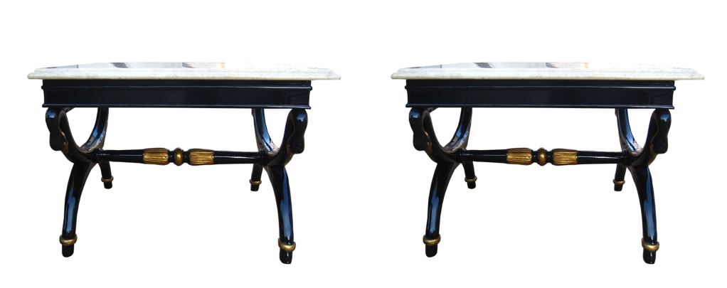 These are a beautiful black lacquered mahogany side tables with carved gilded swans and marble top. These wonderful side tables are handsomely proportioned with a clear nod to the fanciful. Brilliantly executed.

If you are coming to our show room