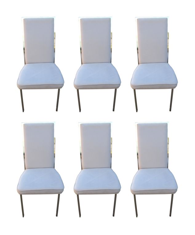 Fabulous set of 6 high back dining chairs in the style of Milo Baughman.
The chairs are very sleek and very sturdy, they date from the 1970's.
The chairs are in very good vintage condition, the chrome is clean but not perfect, as in any original