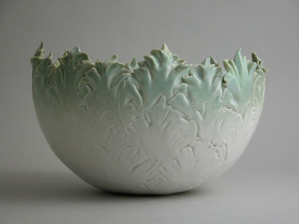 Hand built high-fired ceramic form, glazed in celadon.