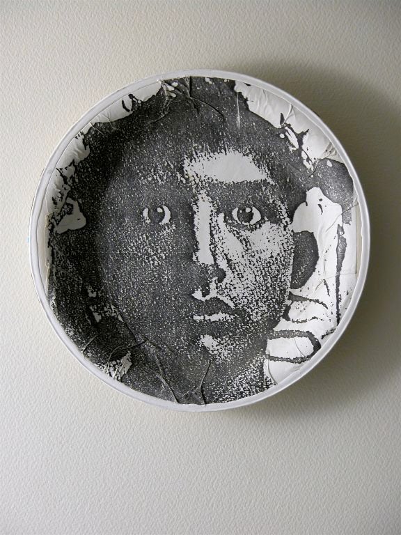 Molded plates of pulp paper decoupaged with male imagery, 

photocopied and manipulated through use of the Xerox machine.