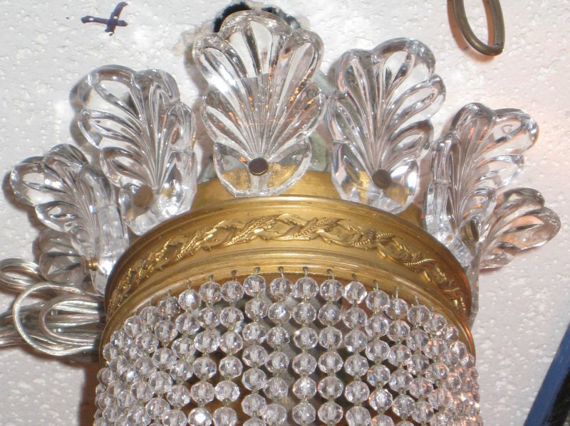 Pair of Empire Style Bronze and Crystal Chandeliers by Baccarat