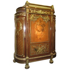 Très importante commode haute de style Louis XVI en marqueterie et parqueterie, de taille palais