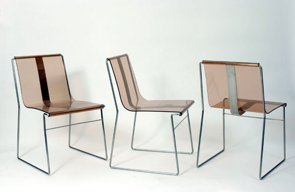 Jacques Charpentier.

A set of four plexiglas dining chairs, two clear, two smoked.