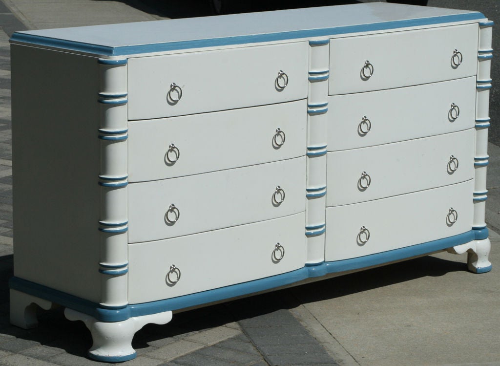 Huge 8 drawer dresser in white lacquer and baby blue paint designed by Dorothy Draper for the Greenbrier and built by John Stuart Furniture.  White Lacquer with green drawer interiors.  Replaced nickel plated solid brass ring pulls.