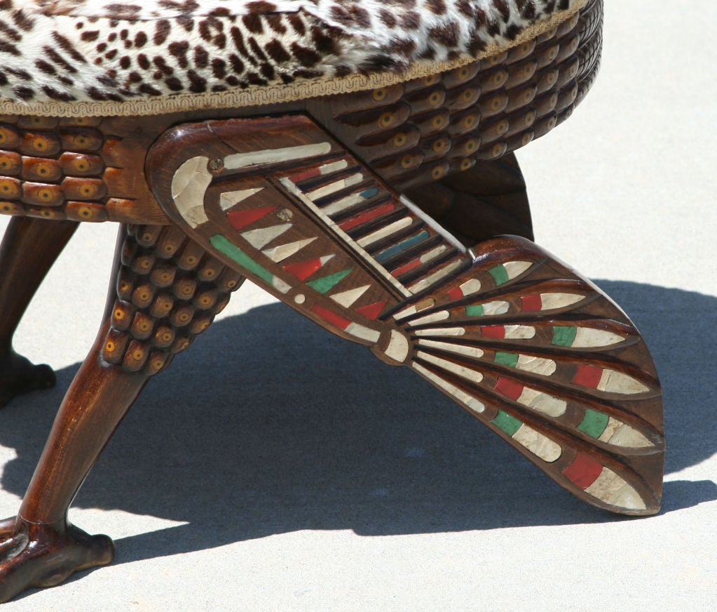 Egyptian Revival Stool in the form of a sacred Ibis, the vintage 'leopard' padded oval seat on stylized wings and legs inlaid with vintage celluloid and bakelite.