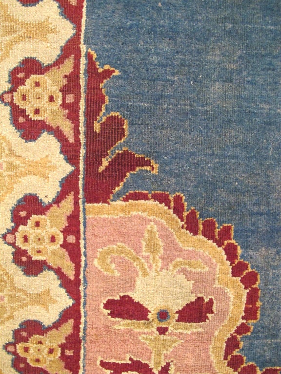 Antique 19th Century Indian Agra Rug in Solid Blue Background In Good Condition For Sale In Atlanta, GA