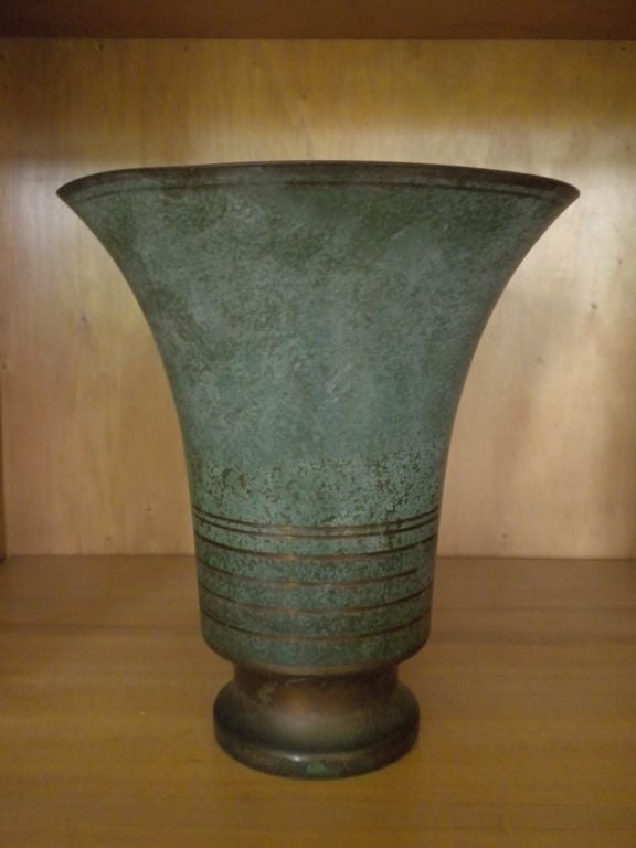 A bronze Vase (this is the smallest of the three in our current collection) hand tooled and finished to a verdigris patina by Carl Sorensen. Signed at the back of the Vase 