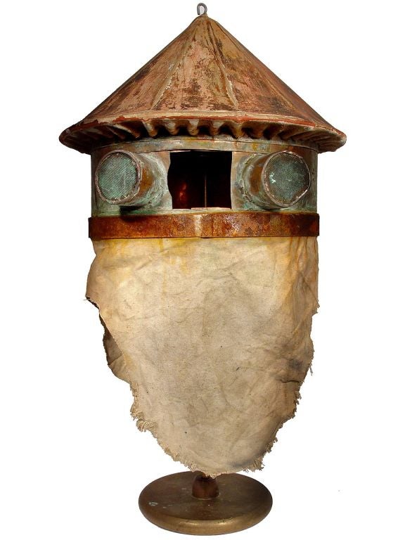 This item is amazing as well as bit bazaar... but typical of the rare odd objects you will find on my web pages. It's an early home-made beekeeper's helmet. I have never seen another like it. There are interesting details throughout. Inside is a