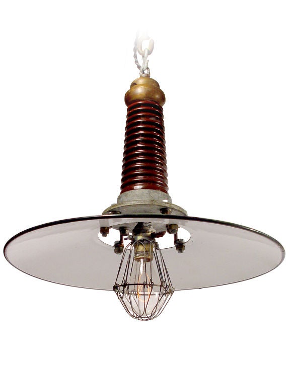 I call them Tesla lamps because they simply look as if they came out of his electrical testing lab. The feel is a bit 20th century high tech with a touch of Frankenstein.  These are perfect 17