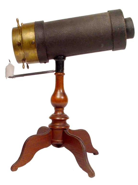 1873 Bush Kaleidoscope 4 Leg <br />
This is an original untouched Charles G. Bush Kaleidoscope. This example would be most interesting for the seasoned collector. It's signed and dated on the brass ring and sits on the on the more desirable and