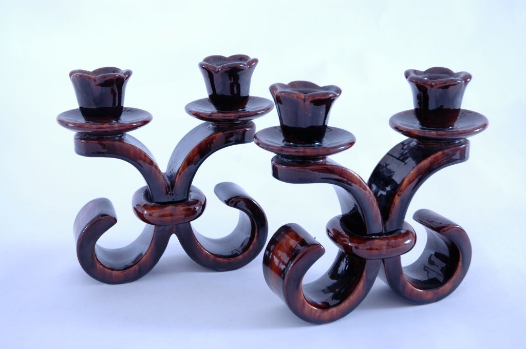 Pair of expresso glazed ceramic candle stick holders