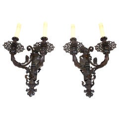 A very large pair  of  French 19 th century wrought iron sconces