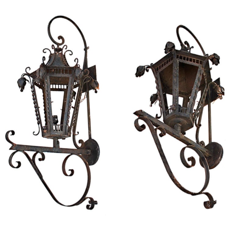 very large antique  outdoor wrought iron sconces