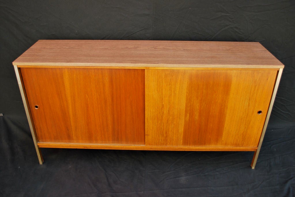 a simple but elegant buffet by Paul McCobb, in person the wood is a little darker, but look lighter on the picture due to the flash of the camera.

ALL SALES ARE FINAL, STORE CREDIT OR EXCHANGE ONLY