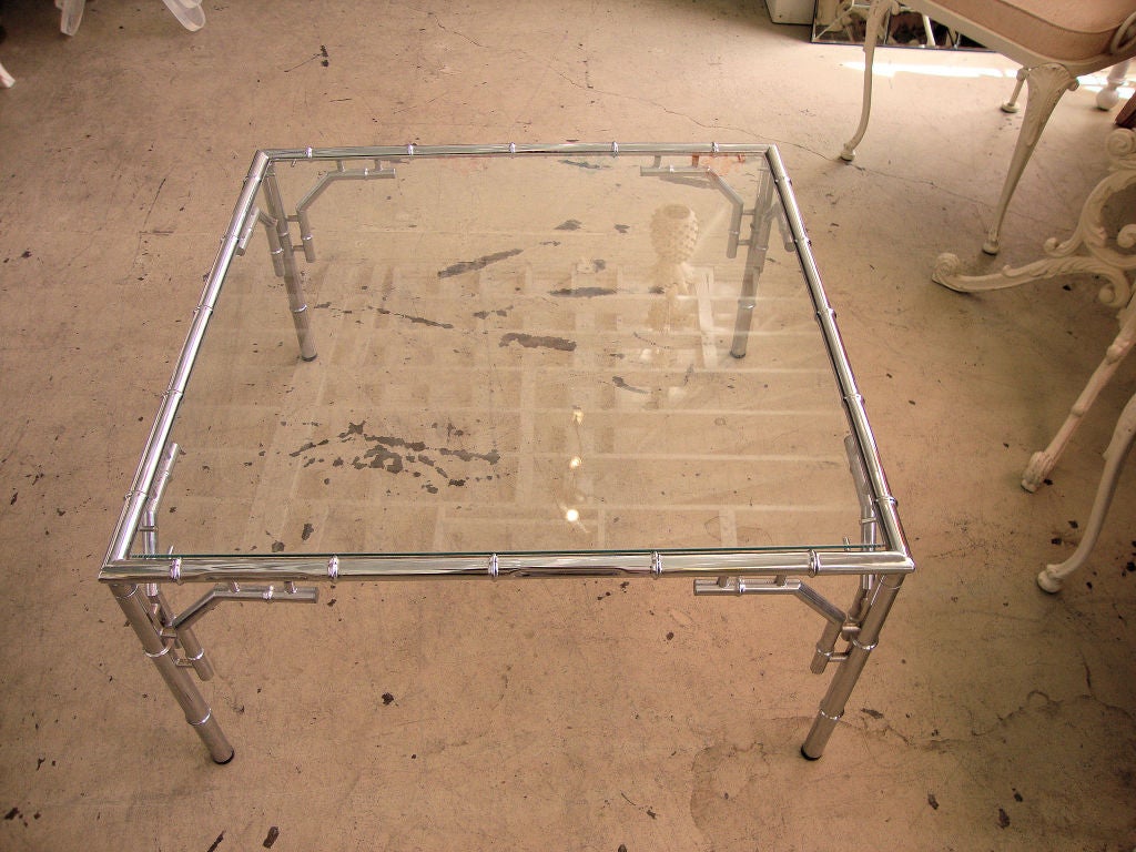 This Chrome Faux Bamboo Coffee Table is in nice as found VINTAGE condition with new glass top.  There are minor imperfections to the original chrome finish.  LOVE it--<br />
<br />
keywords:  Hollywood Regency