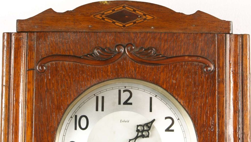 An English Art Deco Regulator Wall Clock in oak with the Enfield mark on the face and parquetry inlay at top