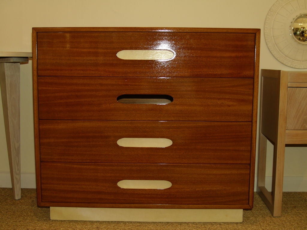 Beautifully restored chest of drawers with a goatskin base and goatskin embedded handles.