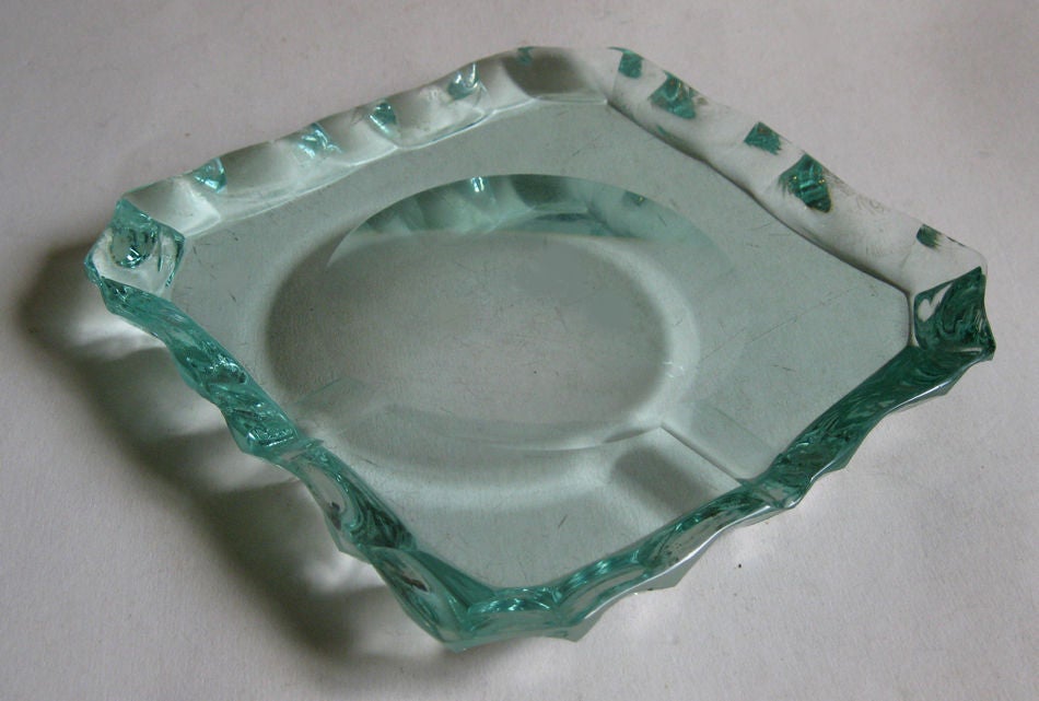 SALE Boston Design Center

Scalloped edge green glass crystal ashtray by Pietro Chiesa for Fontana Arte.

  