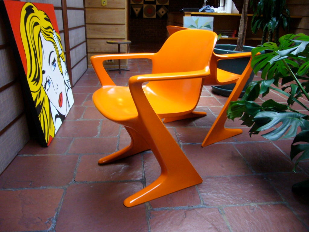 German Pair of Orange 'Kangaroo' Arm Chairs by Ernst Moeckl